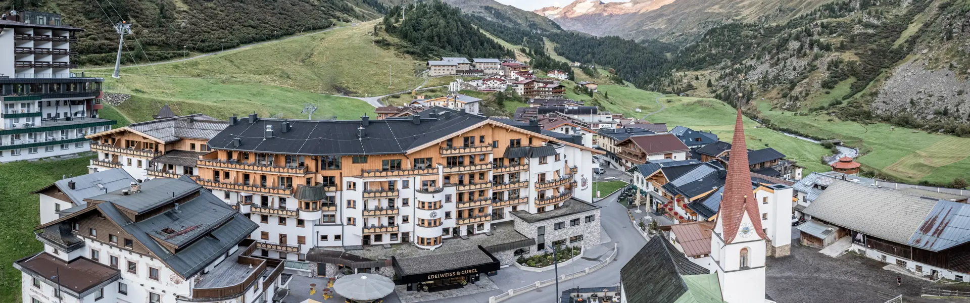 Exterior view from the Edelweiss & Gurgl in summer