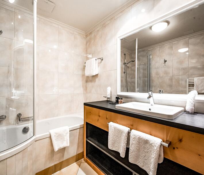 hotel bathroom with bathtub